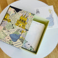 Decorative book style case with fairy tale design, memo pad inside