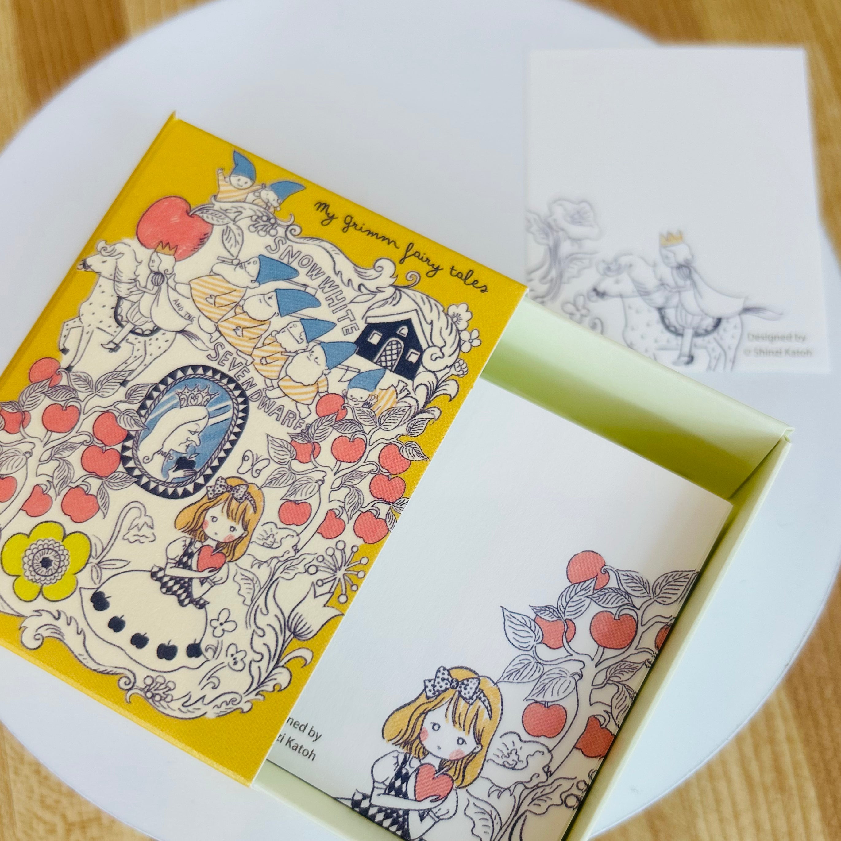 Illustrated book style case with memo pad