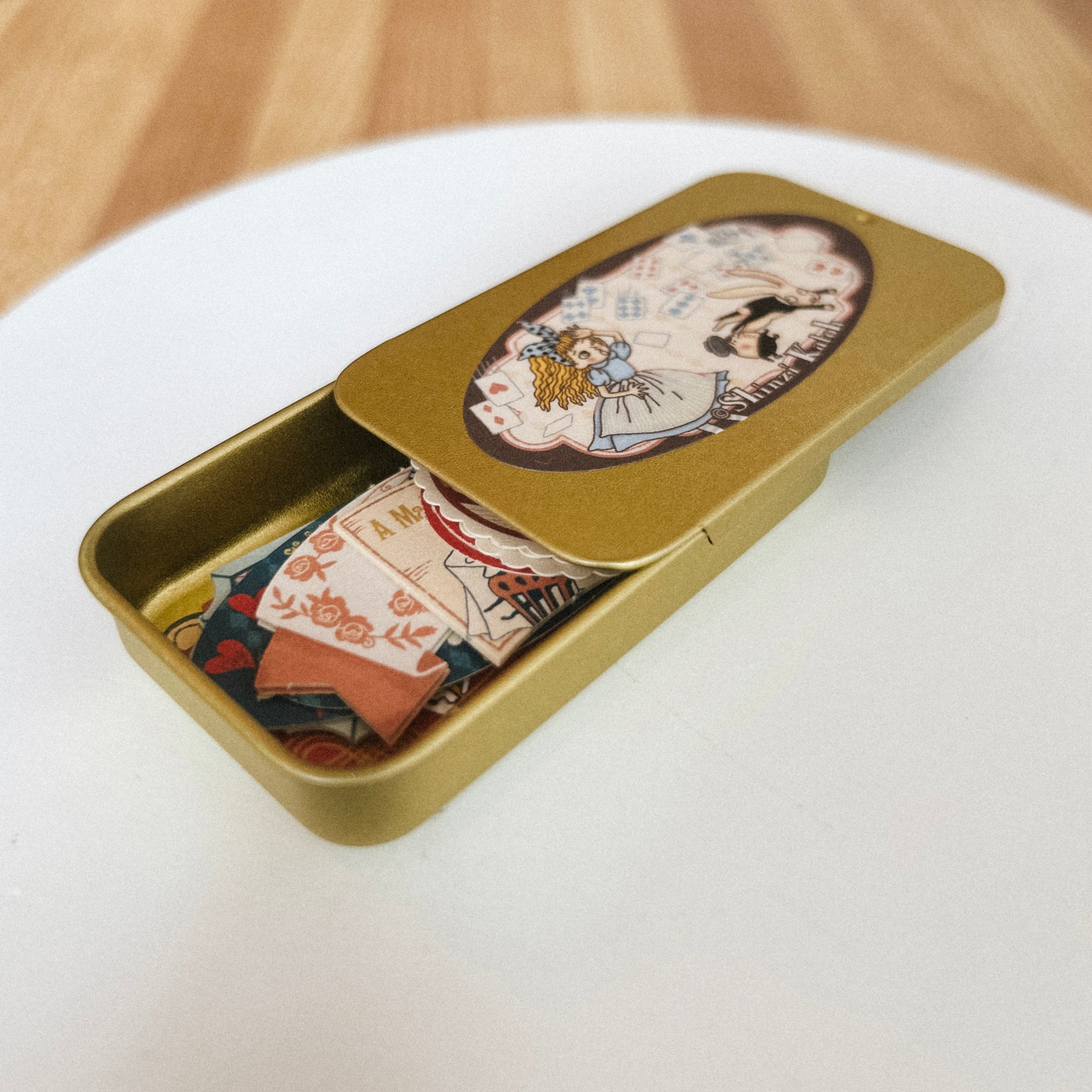 Gold tin box with Japanese flake stickers
