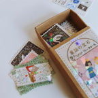 Collection of Japanese stickers with a box labeled 'Fairy Tales' on a white background